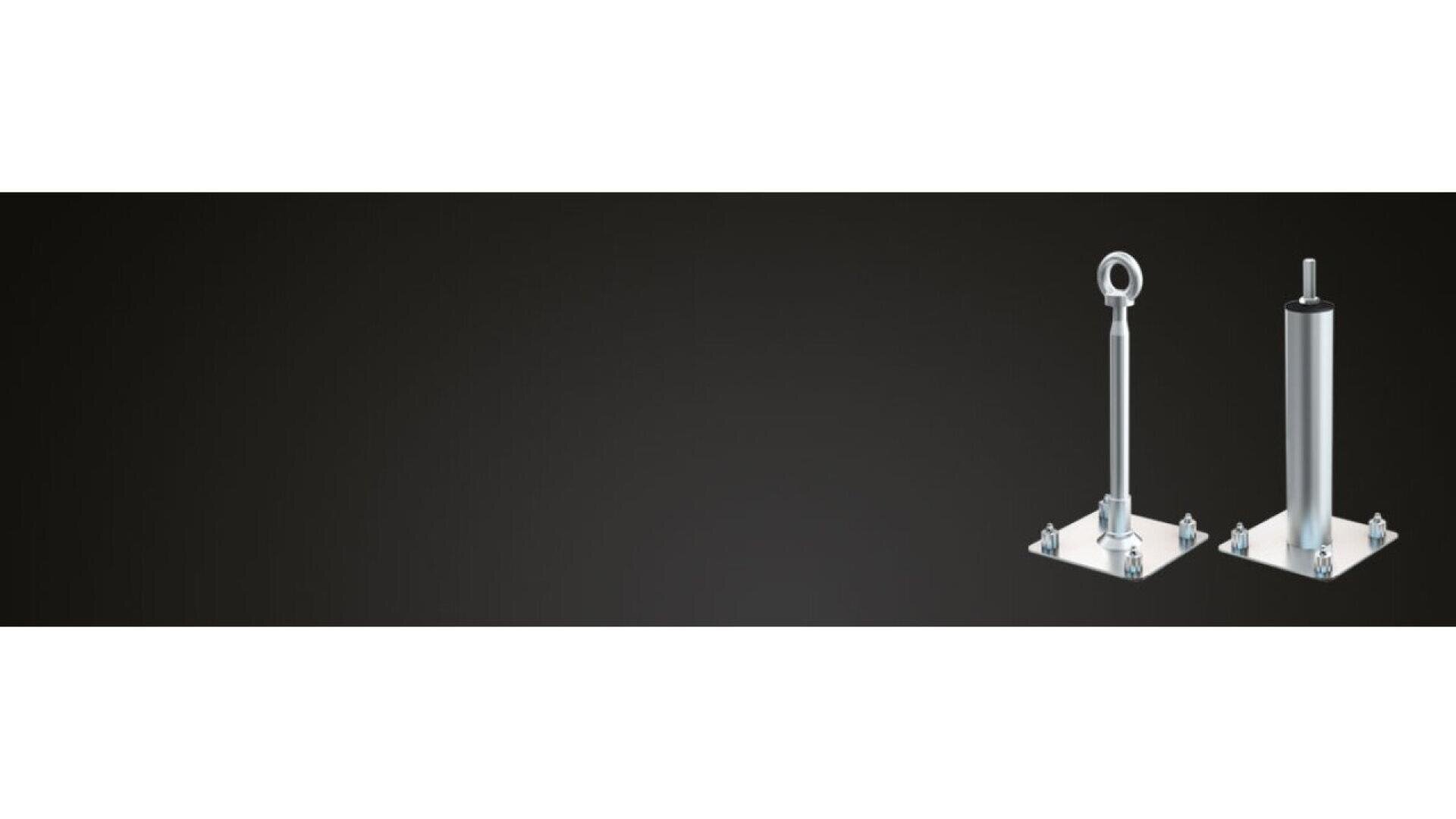 Two metal anchor posts with square bases, bolts, and different tops—one with an eye loop and one with a cylindrical cap—are positioned against a plain dark background.