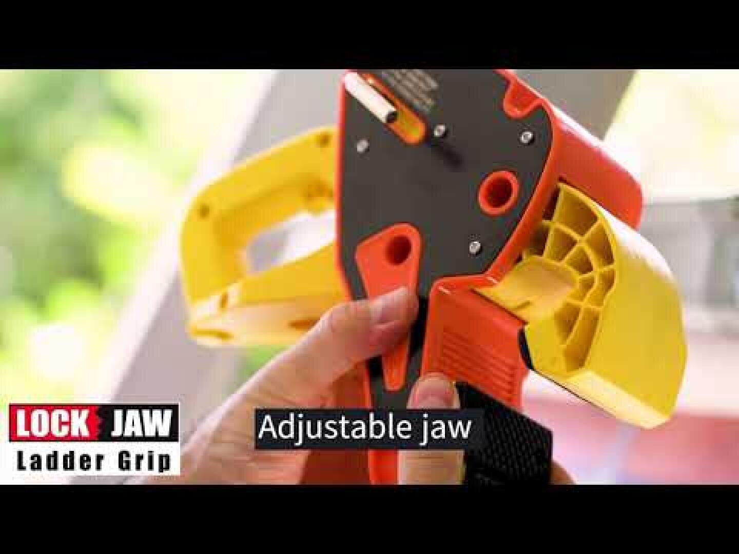 A person holds a yellow and orange Lock Jaw Ladder Grip tool, focusing on its adjustable jaw feature. The text on the image reads LOCK JAW Ladder Grip and Adjustable jaw.