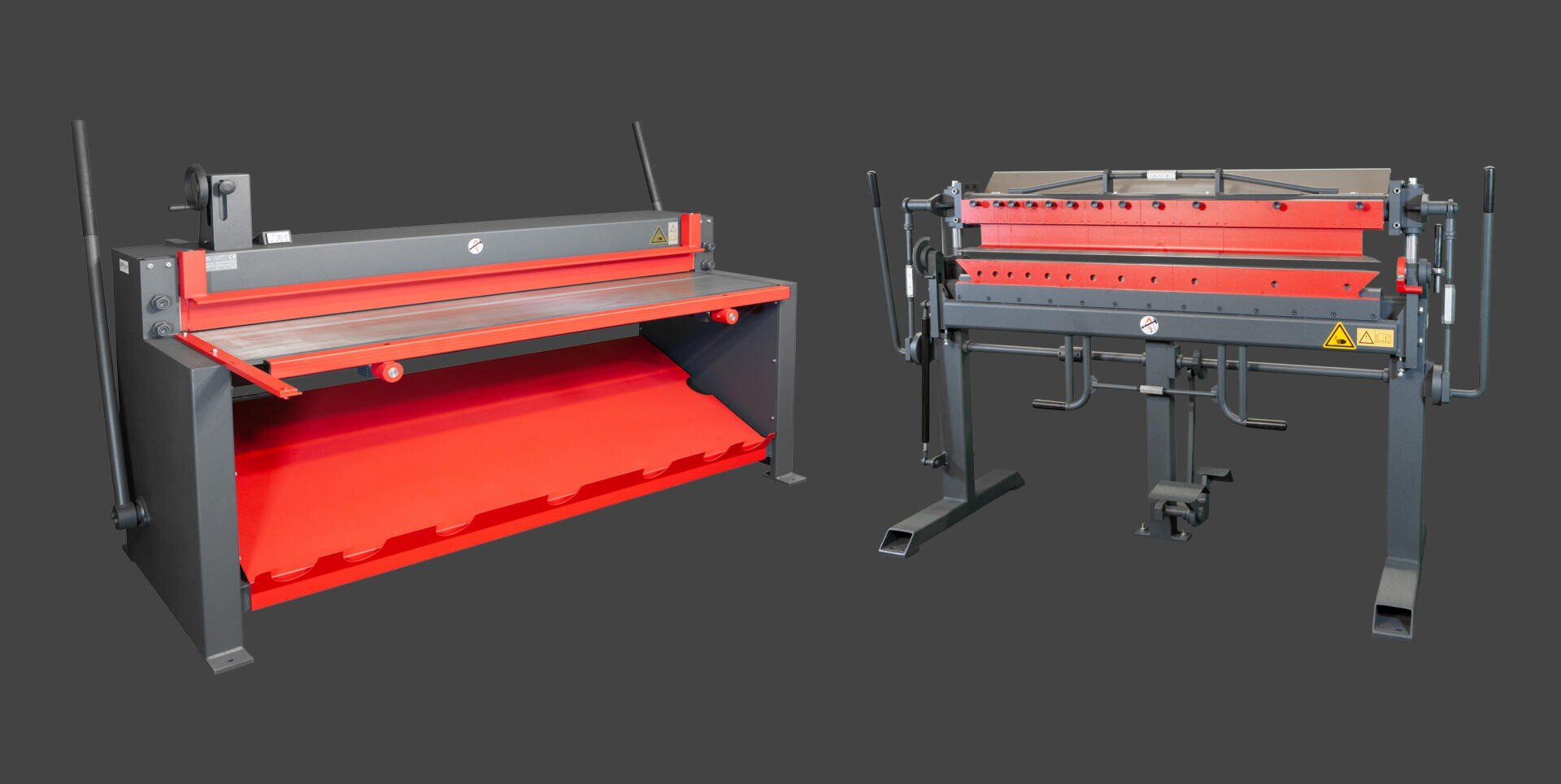 Two red and gray industrial sheet metal working machines against a plain dark background; the left machine is wider and has a flat surface, while the right machine is more compact and has adjustable levers.