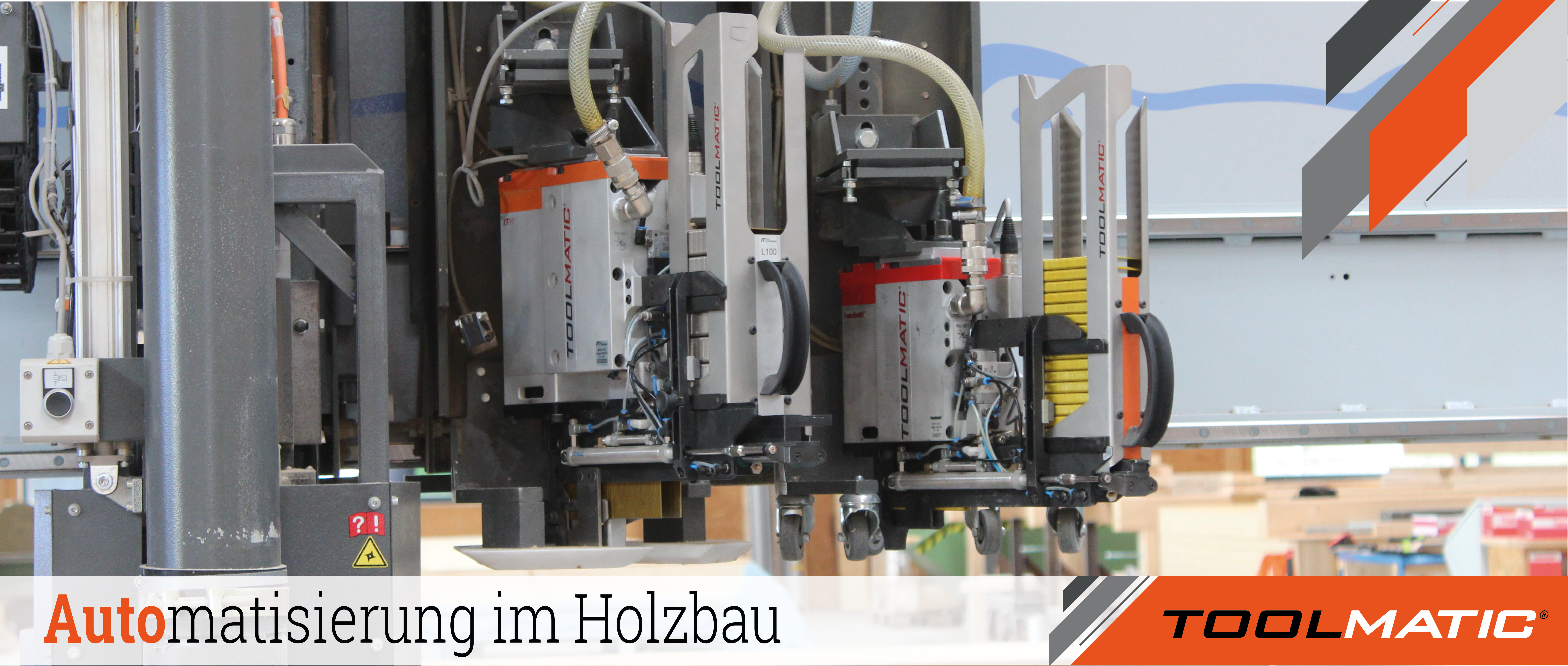 Close-up of advanced automated woodworking machinery with multiple robotic arms in a workshop. Text reads Automatisierung im Holzbau and Toolmatic with orange-gray branding accents.